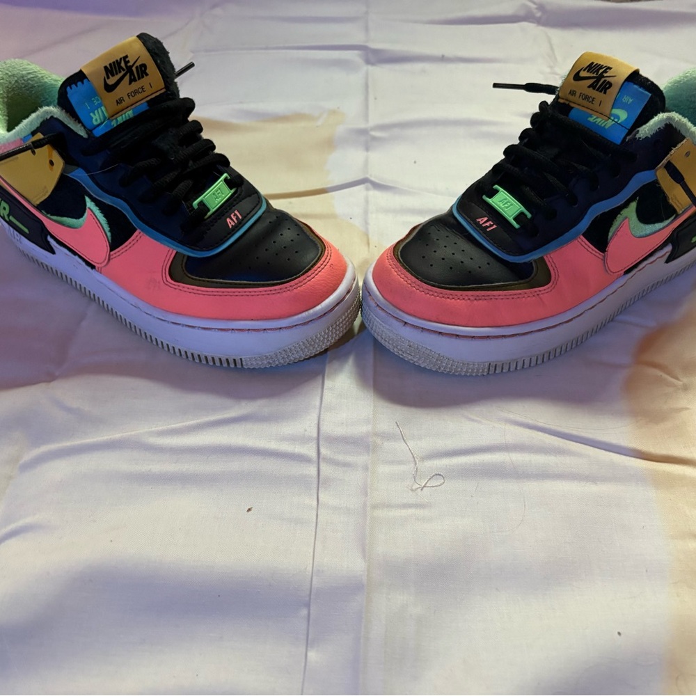 Nike Low-Top Sneakers — Pink, Black, Yellow, Teal Accents